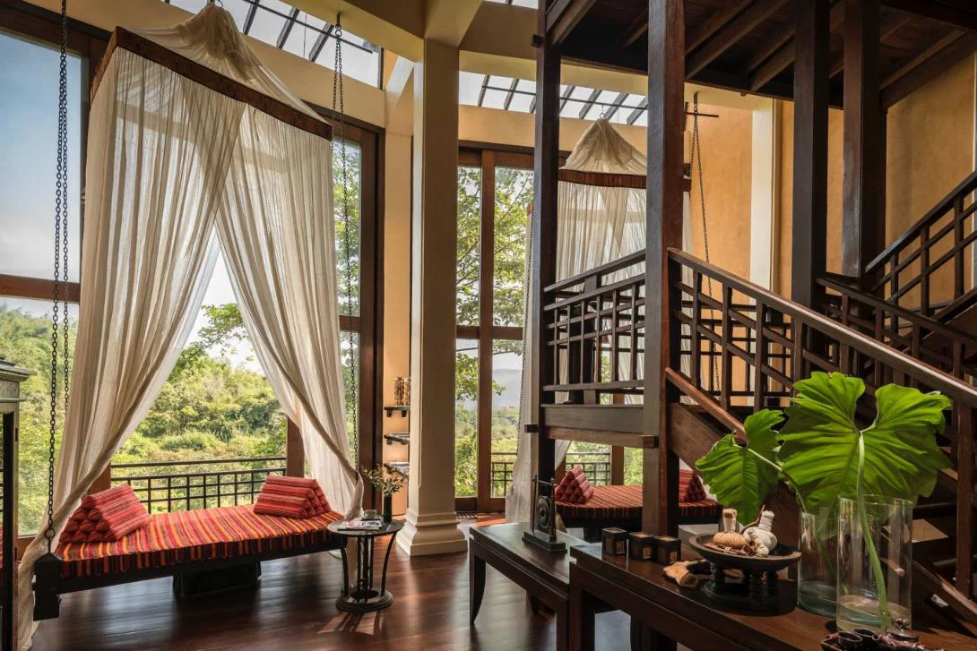 Hotel room with big windows and curtains in Northern Thailand
