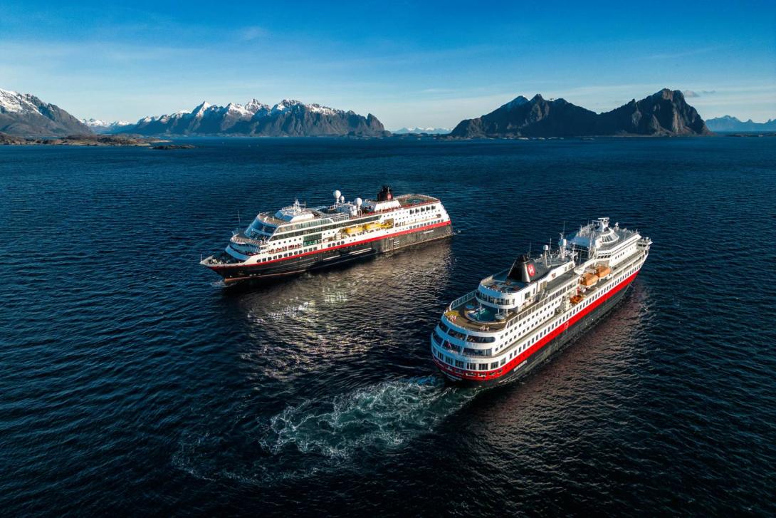 MS Finnmarken and MS Midnatsol crossing on the Norwegian coast MS Finnmarken and MS Midnatsol crossing on the Norwegian coast