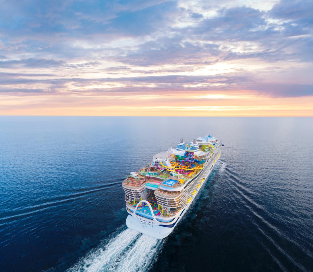 Royal Caribbean Royal Caribbean's Legend of the Seas ship sailing across the sea into a sunset