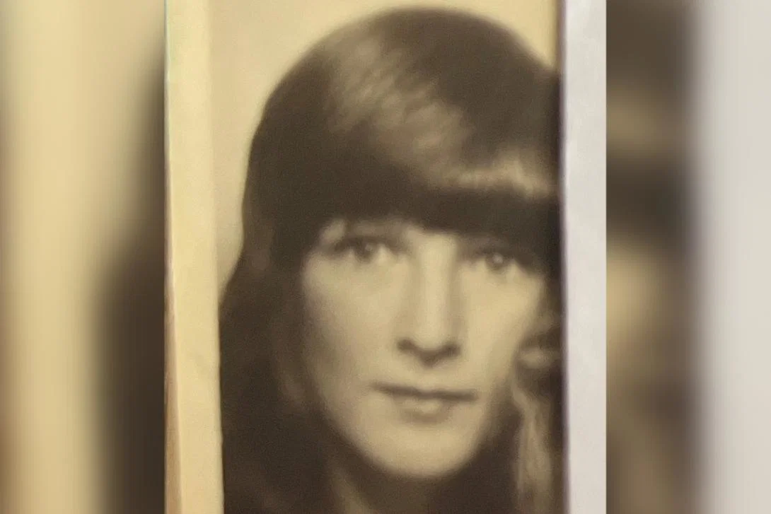 Black and white photo of young woman