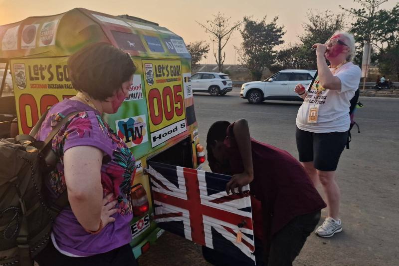Jo O'Connell's sister Lisa watching local Indian man help fix tuk-tuk Jo O'Connell's sister Lisa watching local Indian man help fix tuk-tuk