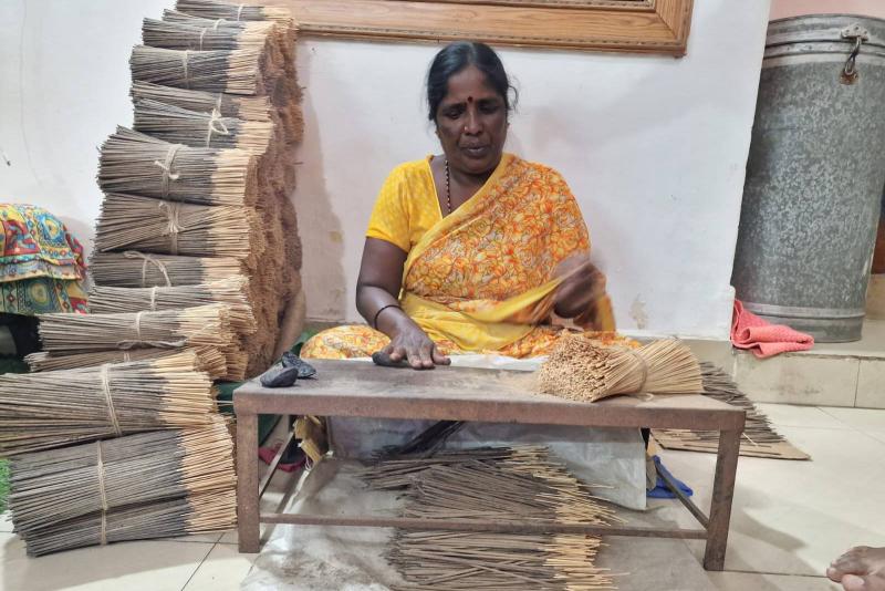 Indian lady making incense sticks in Mysaw Indian lady making incense sticks in Mysaw