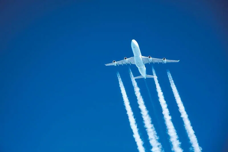 Jet with contrails