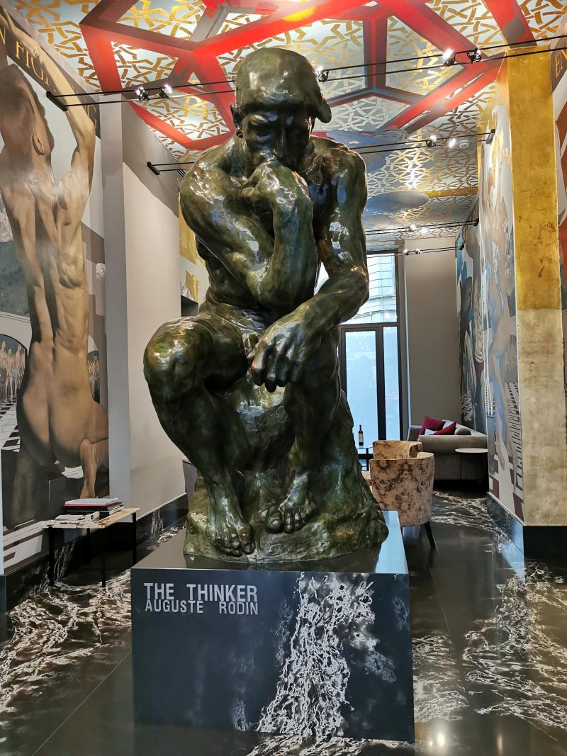 Auguste Rodin's The Thinker in the hotel lobby