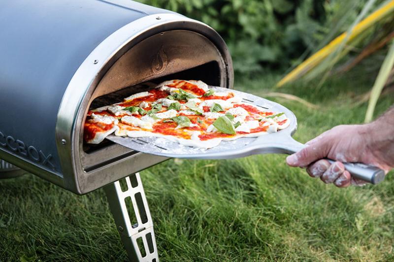 Extras such as a pizza oven can be added for outdoor living