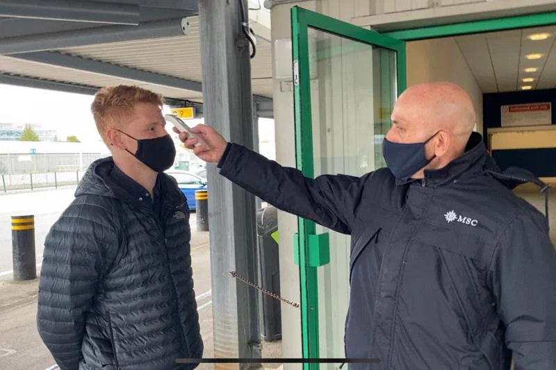 Tom has his temperature checked after arriving at Southampton port