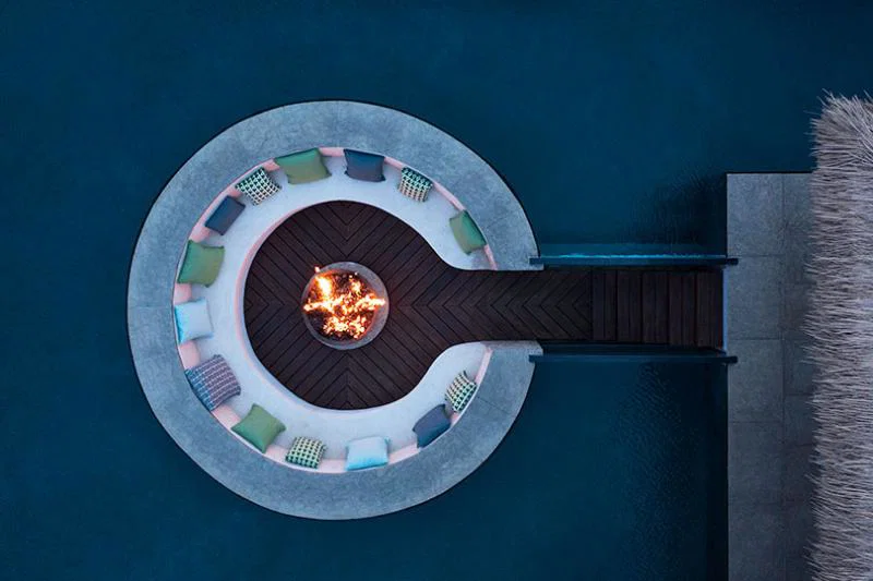 The pool features a glass-encased submerged dry lounge. Credit: Virgin Limited Edition