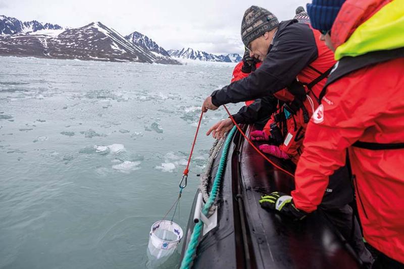 Through the Secchi Disk study Hurtigruten guests help to measure seawater transparency