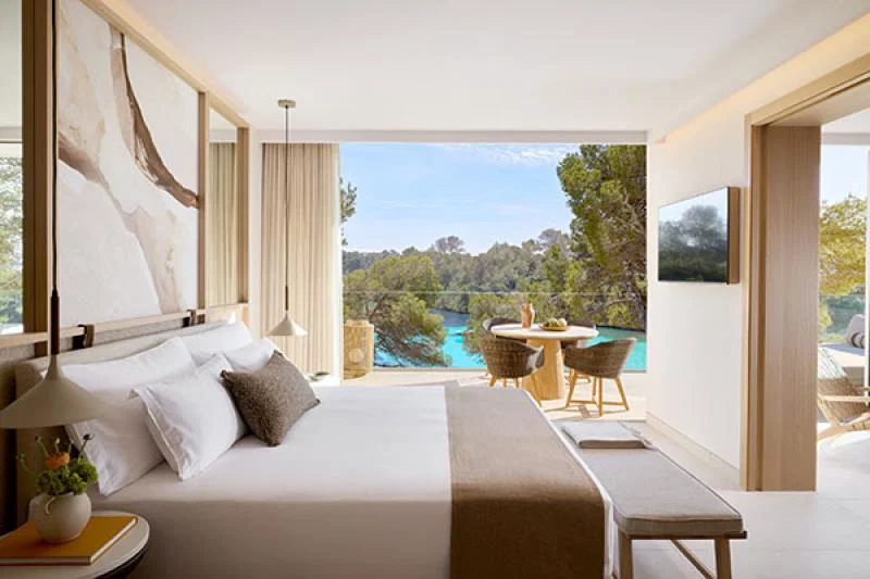 A deluxe one-bedroom sea view room at Ikos Porto Petro