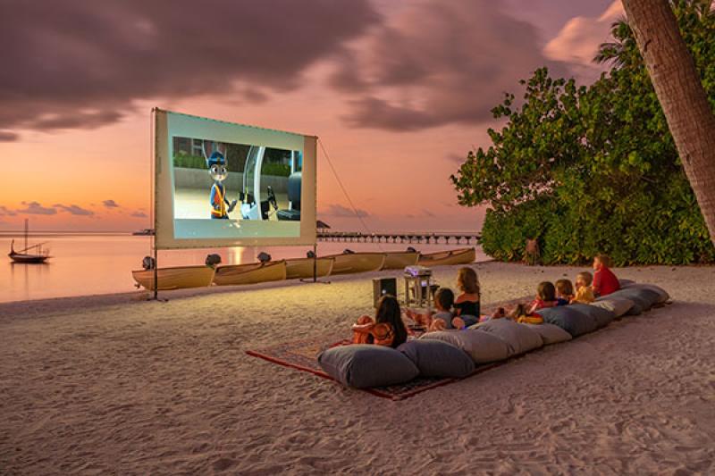 A family spends time together at Gili Lankanfushi Maldives