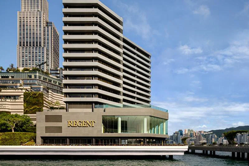 Guests at Regent Hong Kong look out across Victoria Harbour